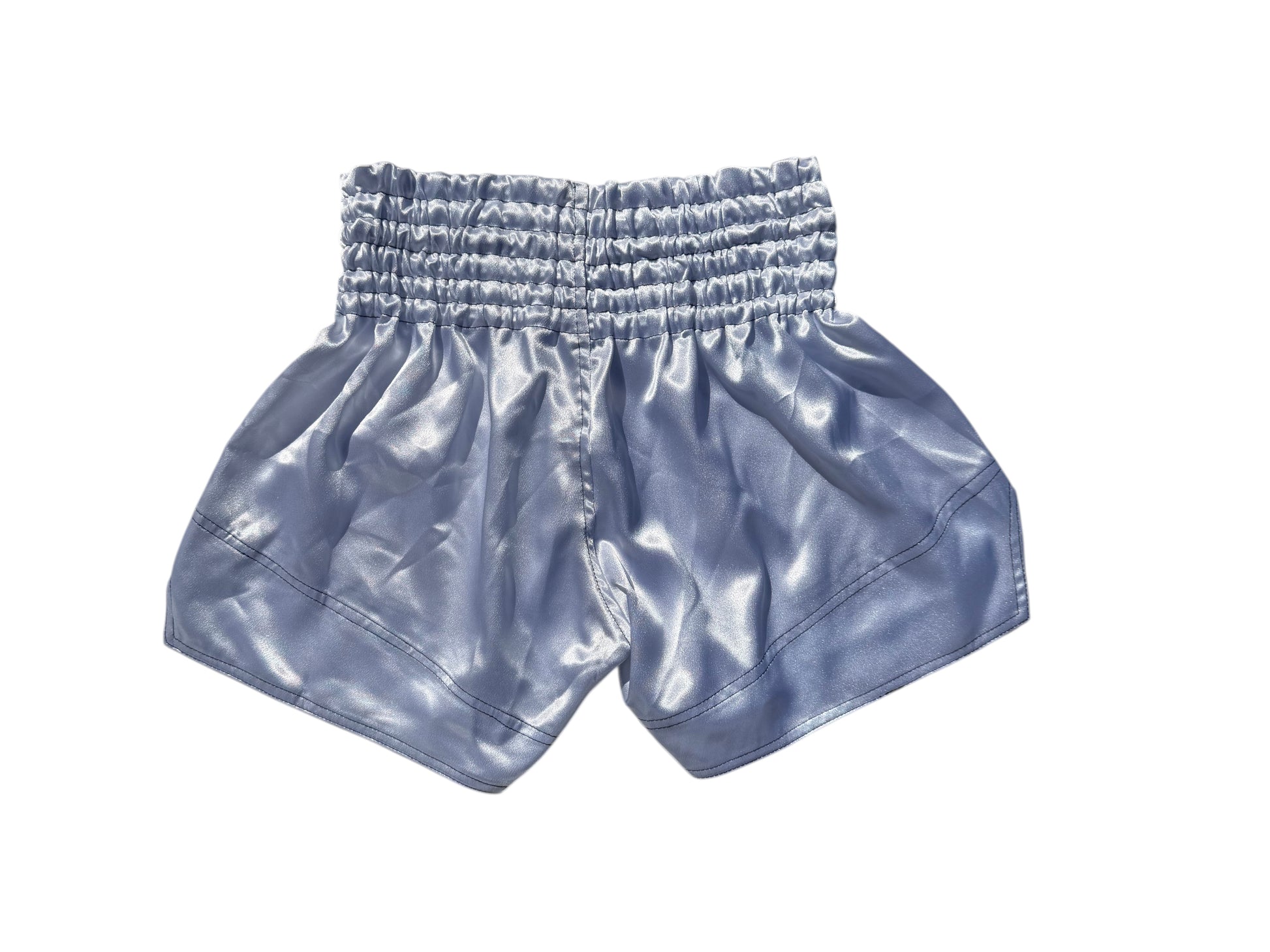 Lodestar Muay Thai shorts in light blue polyester with elastic waistband and side openings for enhanced range of motion.